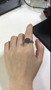 Double Sided Smiley Sad Face Rotating Ring